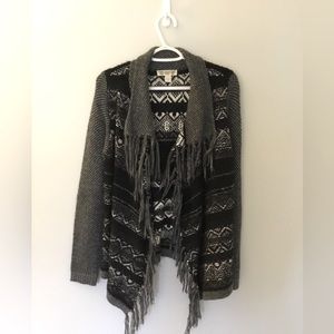 Western style sweater with fringe.  Very good condition.